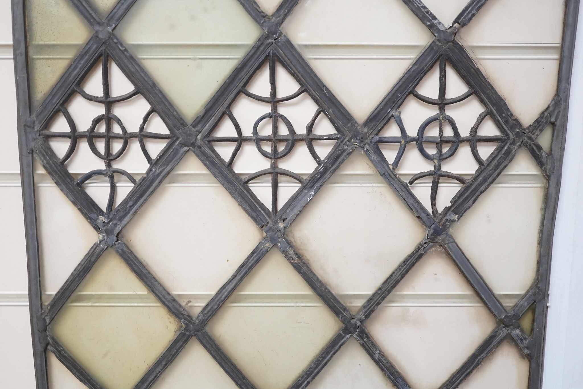 An antique lead and stained glass panel, possibly Elizabethan. 81x42cm